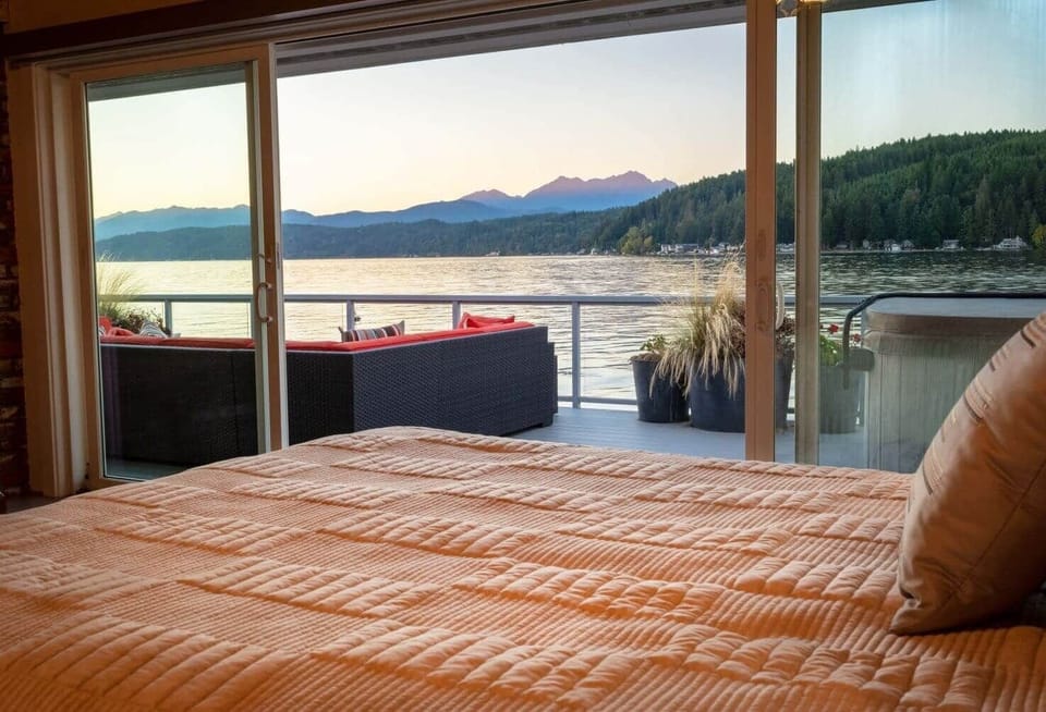 Walls of Glass master bedroom sunset views