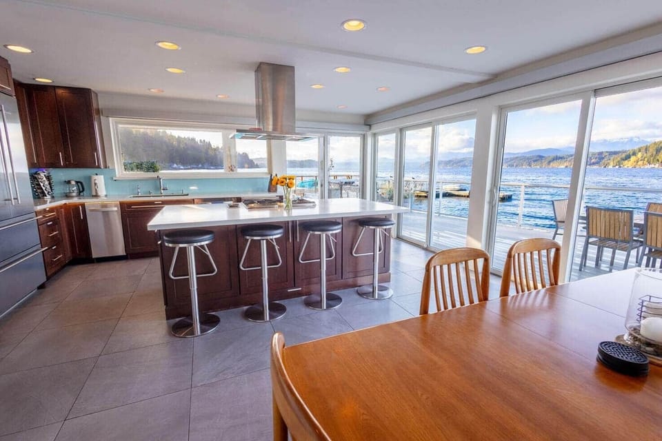 Walls of Glass kitchen with dining area