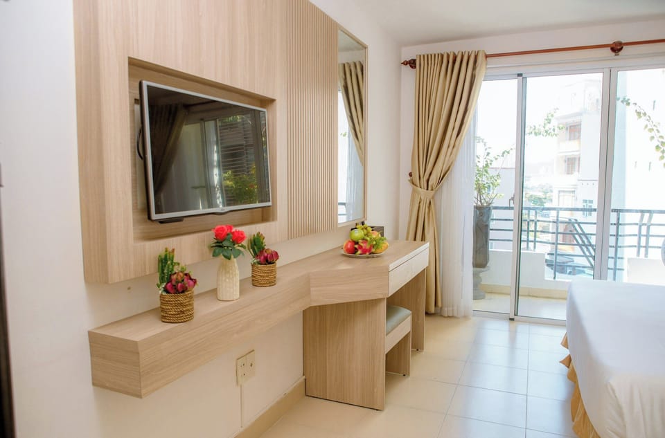 Deluxe Triple Room, Balcony, City View | Terrace/patio