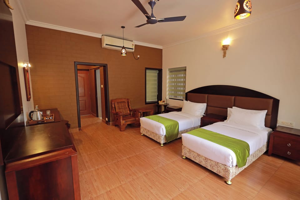 Deluxe Double Room, Garden View | In-room safe, individually decorated, individually furnished, desk