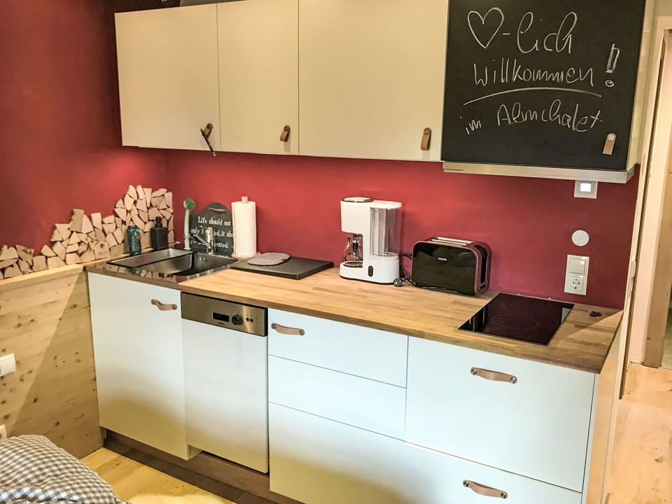 Kitchen Appliance, Kitchen, Interior Design, Countertop, Flooring, Major Appliance, Cabinetry, Floor, Room, Home Appliance