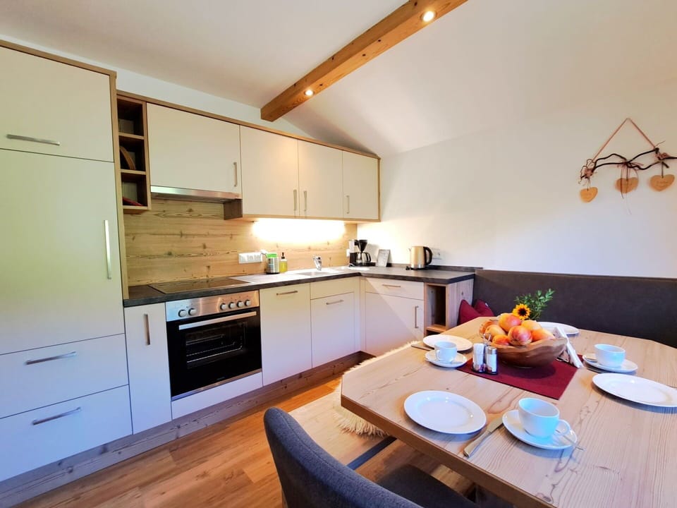 Furniture, Interior Design, Flooring, Wood, Floor, Ceiling, Wood Flooring, Cabinetry, Countertop, Lighting