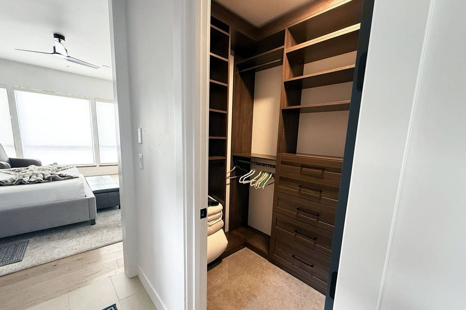 The closet is situated directly off the primary bedroom, allowing for a seamless morning transition