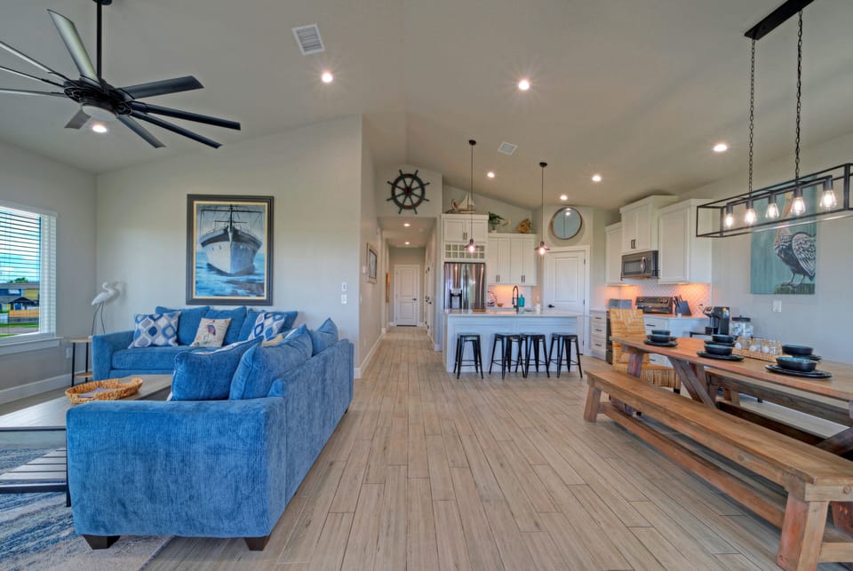 Spacious open living space connected to the kitchen.