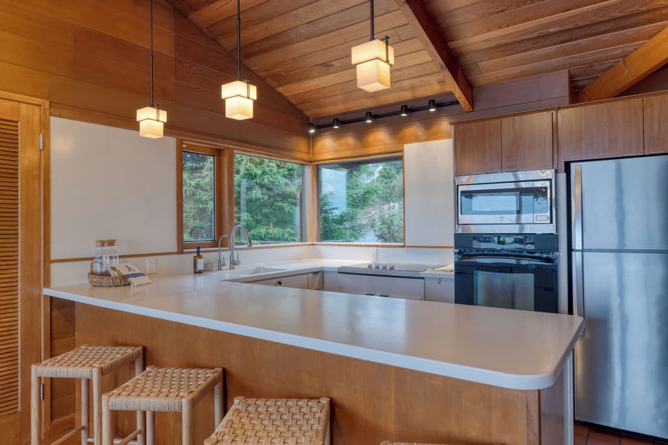 Kitchen with stainless steel appliances.