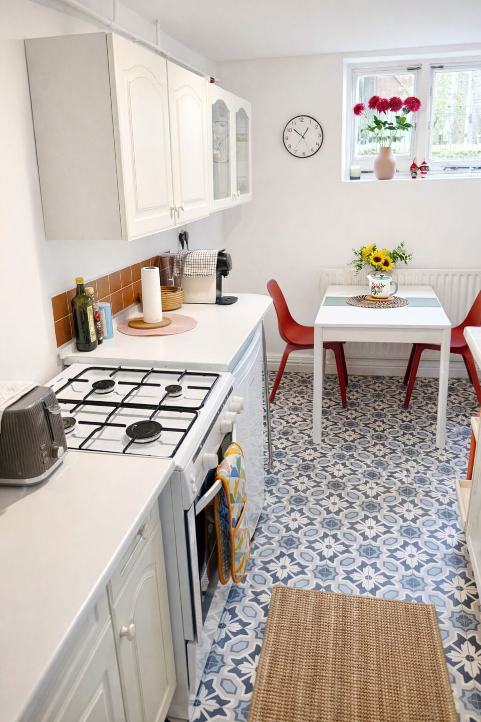 A bright, fully-equipped kitchen.