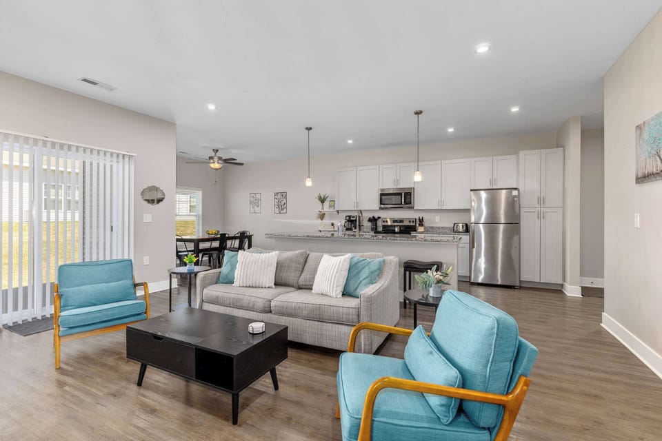 Open-concept living room with comfortable seating and plenty of room to unwind.