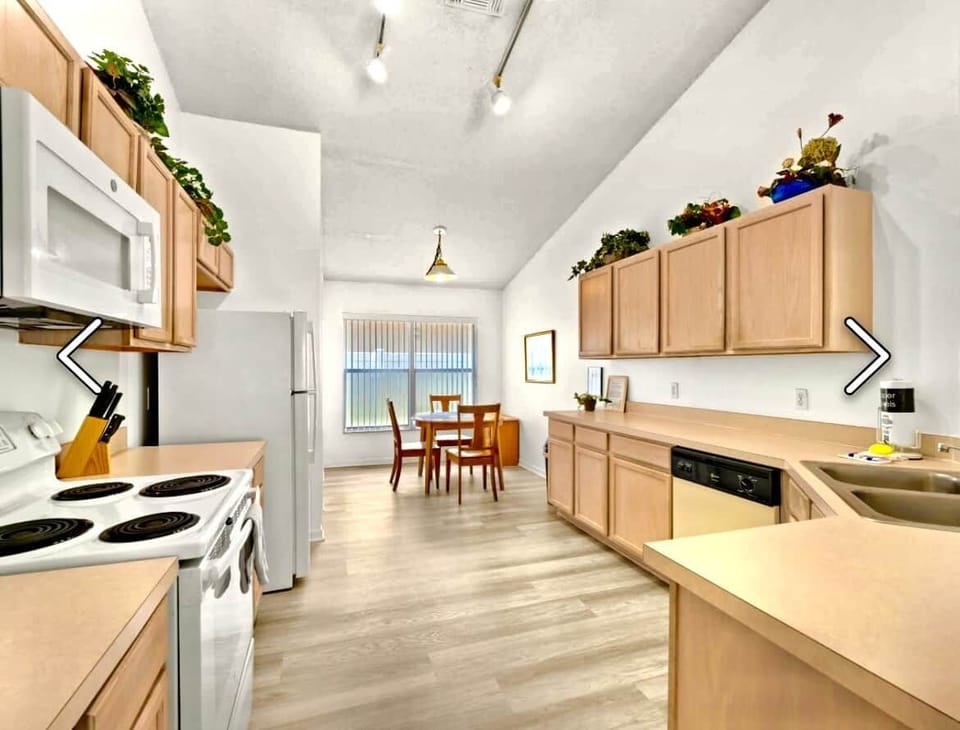 There is a fully fitted kitchen with breakfast table