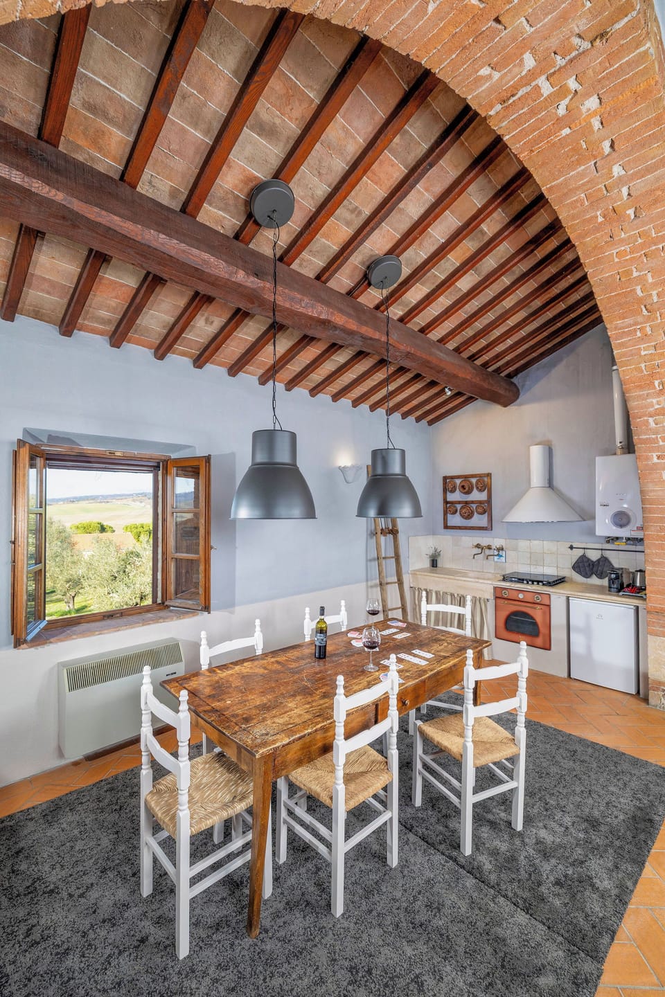 Family Apartment, Hill View | Private kitchen | Mini-fridge, stovetop, highchair, dining tables
