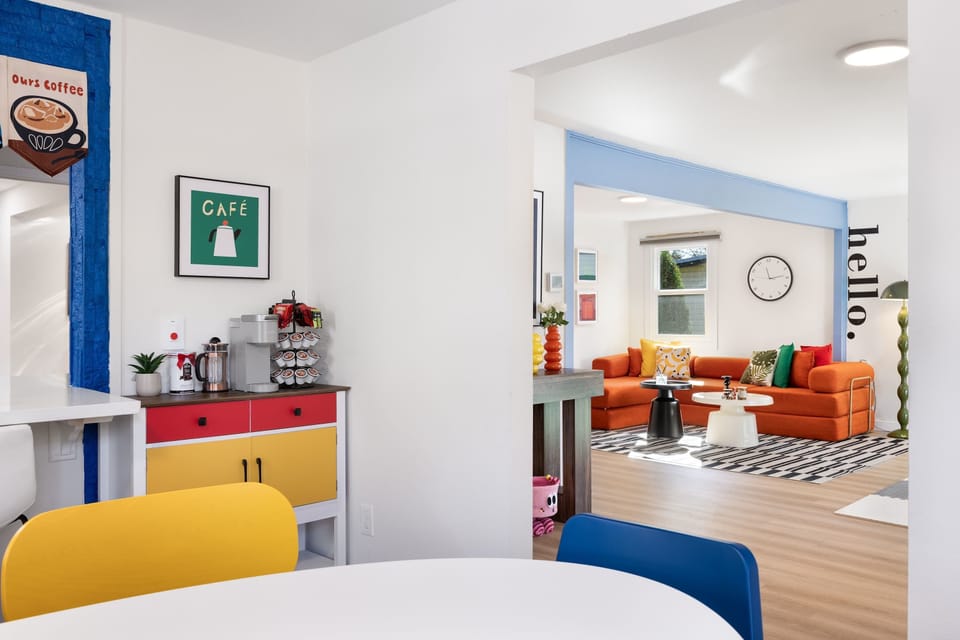 Open layout connecting dining and living for easy conversation and comfort.