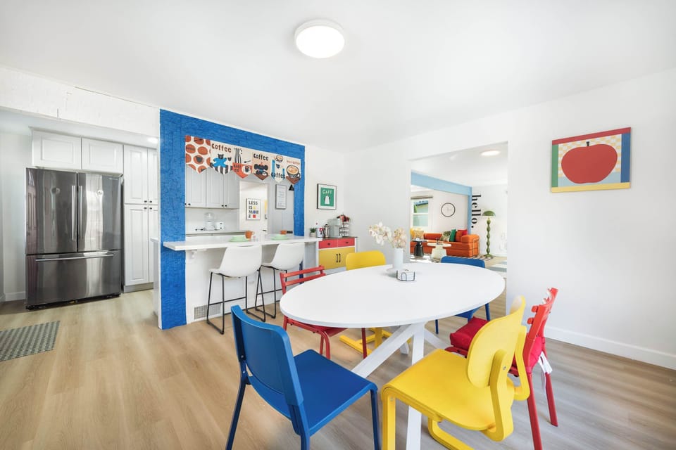 Whimsical dining setup that greets you with color and creativity.