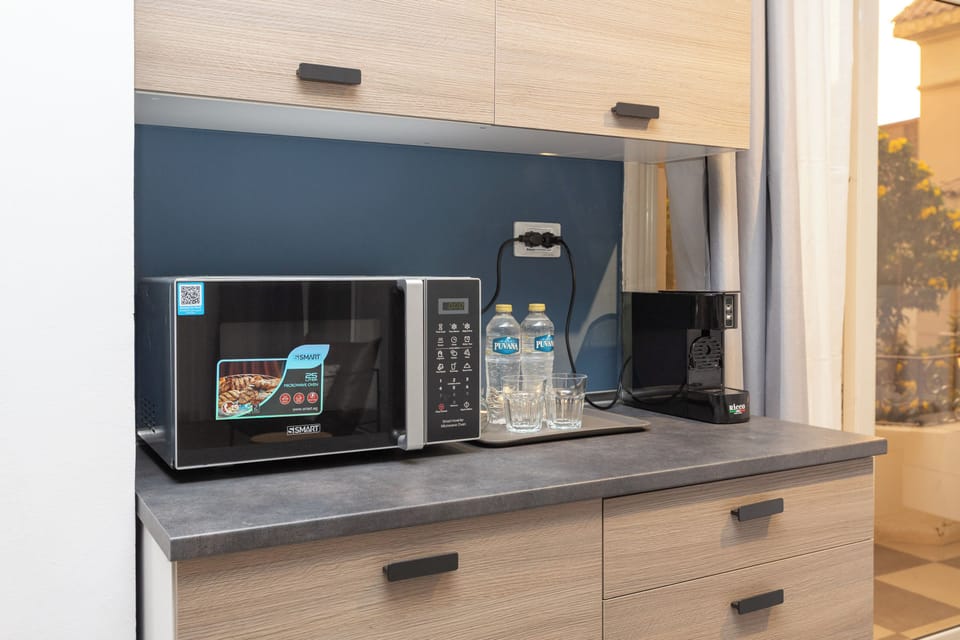 Mini-fridge, microwave, espresso maker, coffee/tea maker