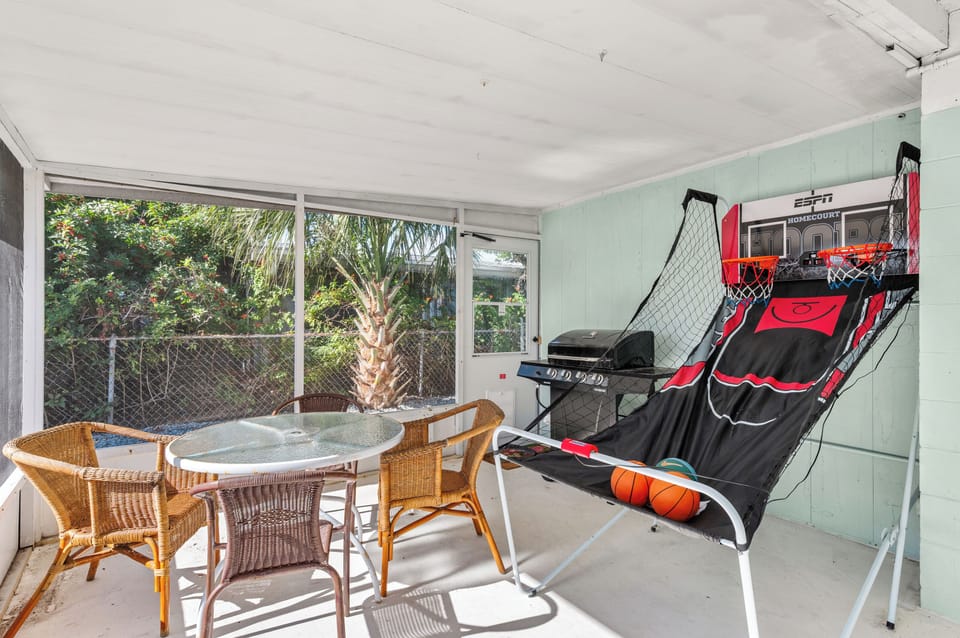 Florida room: arcade hoops + electronic darts