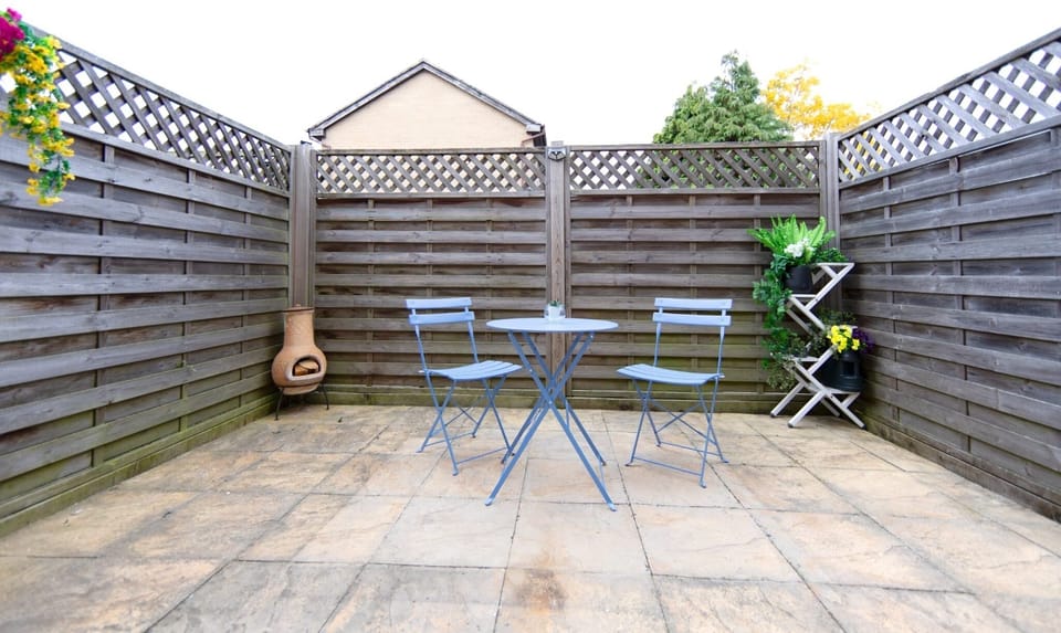 Relaxing Outdoor Patio with Dining Area Perfect for Fresh Air