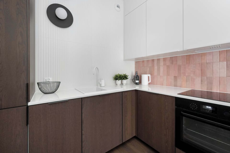The fully equipped kitchenette includes everything you need for a home-cooked meal.