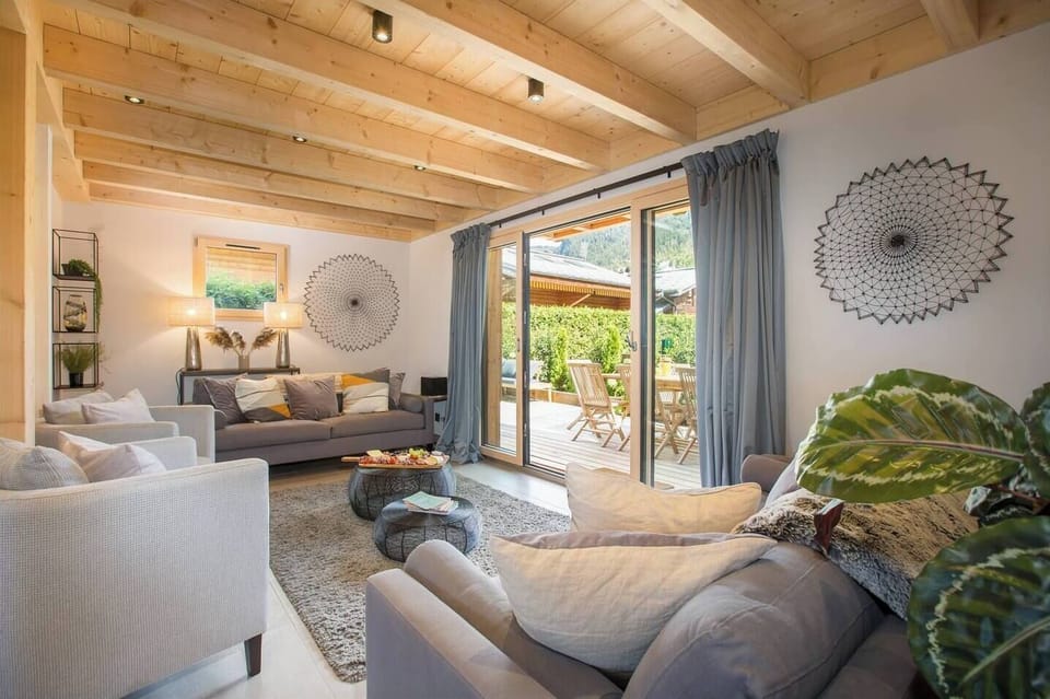 Cosy living area which opens onto the decking at the rear of the chalet