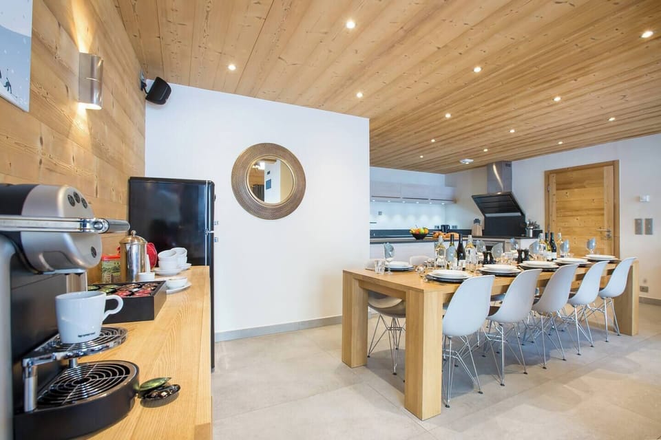 Large Open Plan kitchen with breakfast bar and seperate dining space with Buffet and Nespresso Machine and Additional Wine Fridge