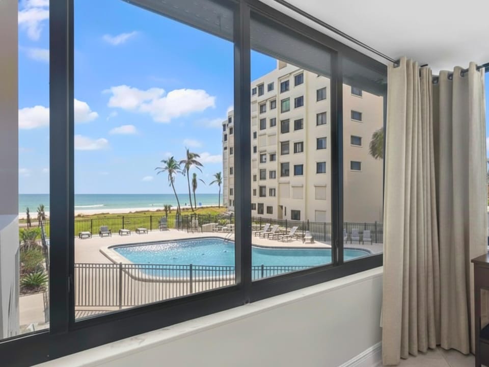 Community Pool View from the Living Room Area