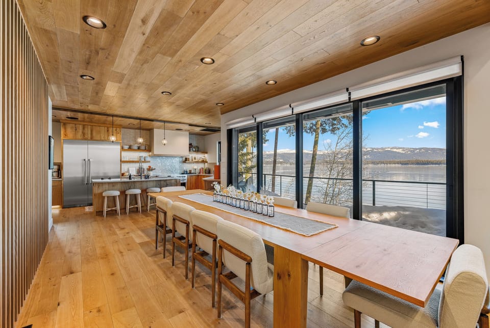 Seamless Design and Functionality! Designed for efficiency and style, the kitchen flows effortlessly into the dining area, making it ideal for entertaining against the backdrop of beautiful views