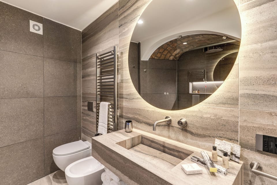 Executive Quadruple Room, Balcony, City View | Bathroom | Shower, free toiletries, hair dryer, bidet