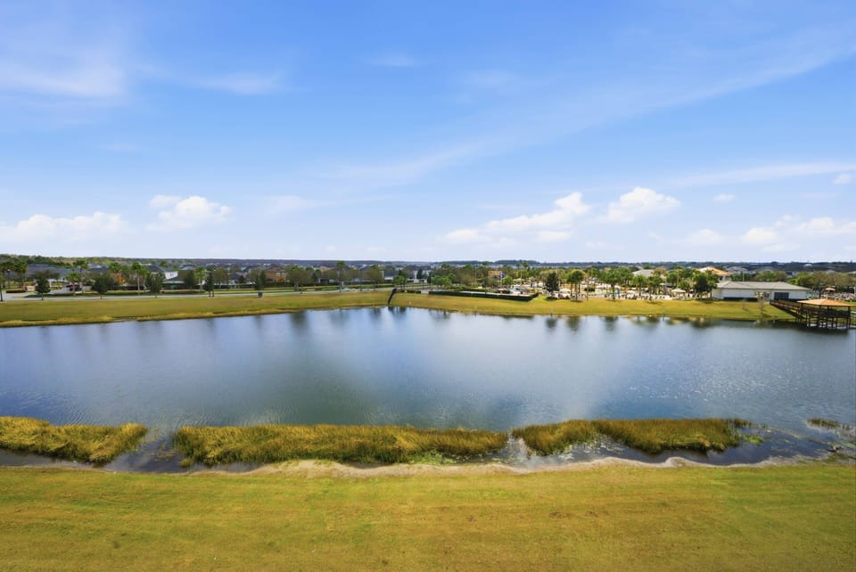 Bask in stunning water views from your balcony, with gentle waves lapping at the shore and vibrant greenery framing the scene. This tranquil setting invites you to unwind and savor nature's beauty right outside your door.