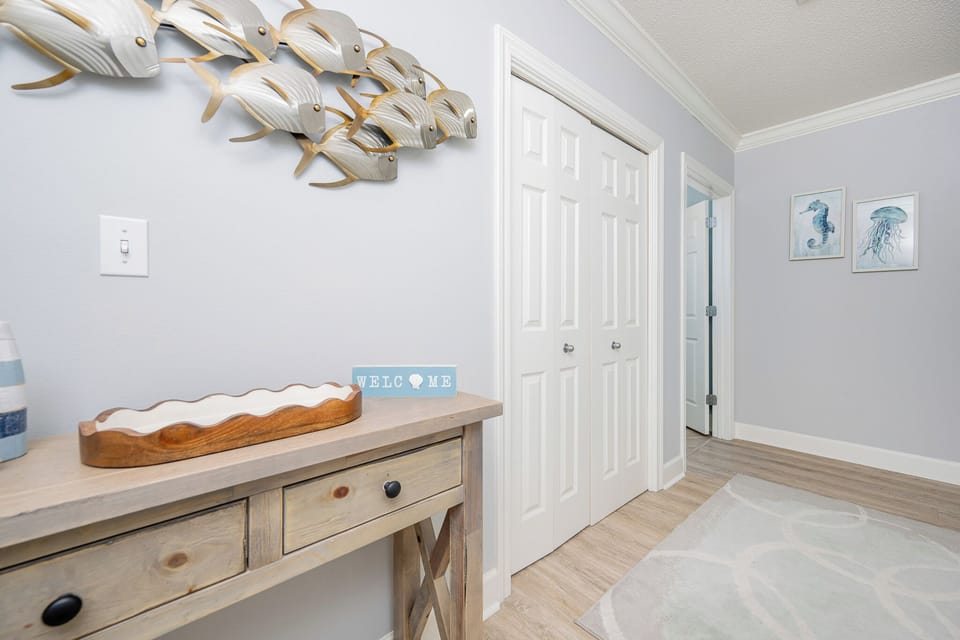 Step inside to a warm welcome featuring charming decor and an inviting entryway that sets the tone for your getaway