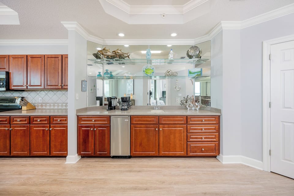 Grab a chilled drink from the fridge or create your favorite coffee or cocktail at the wet bar