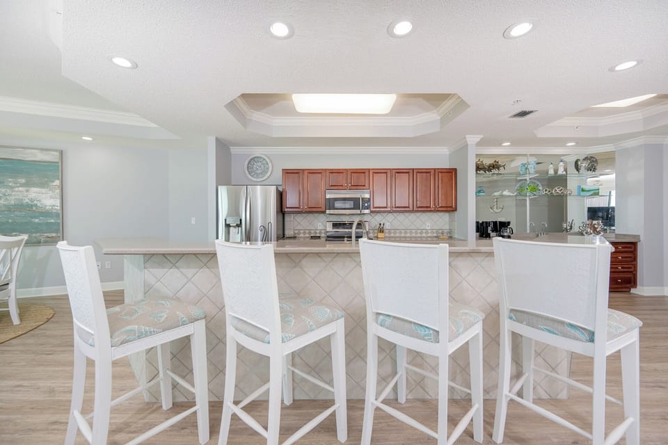 Sip your morning coffee at the breakfast bar and get ready for a day of adventure in this stylish space