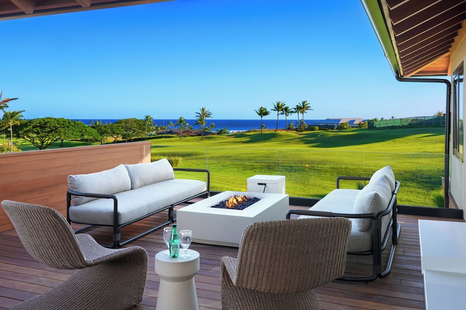 Ocean and fairway views from the upper lanai lounge, a serene spot to sip morning coffee or unwind with evening cocktails.