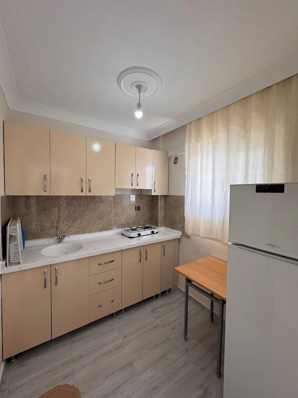 Fridge, stovetop, cookware/dishes/utensils