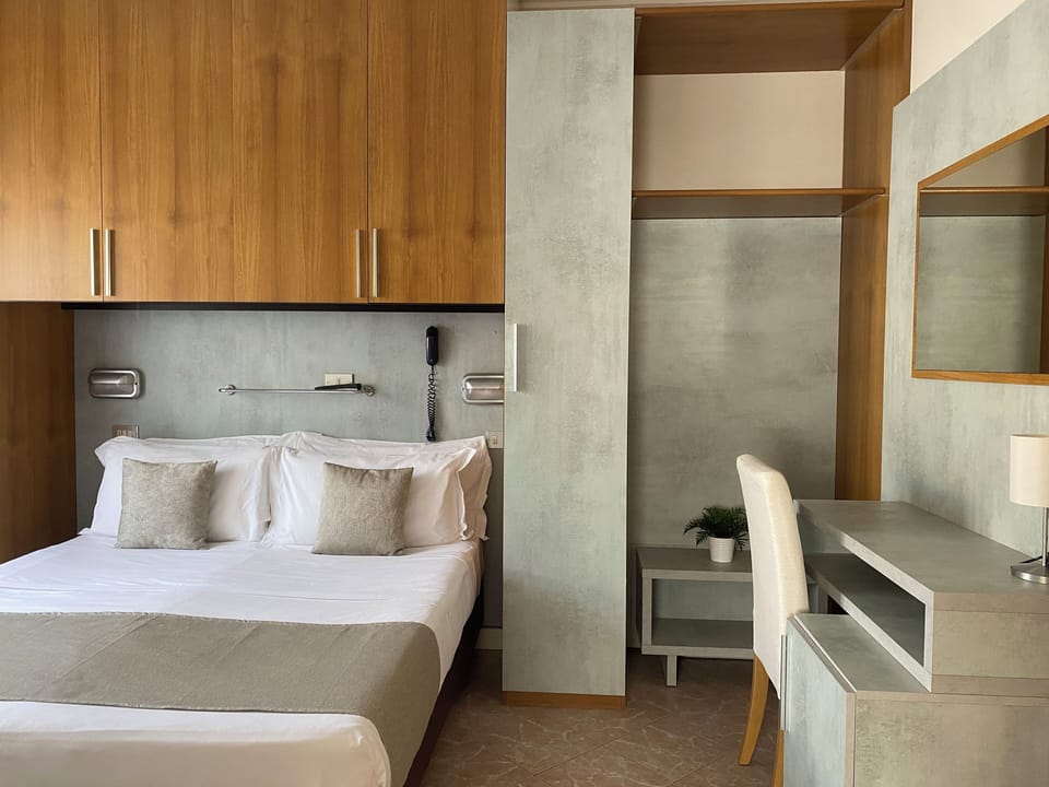 Deluxe Quadruple Room, Balcony | In-room safe, free WiFi