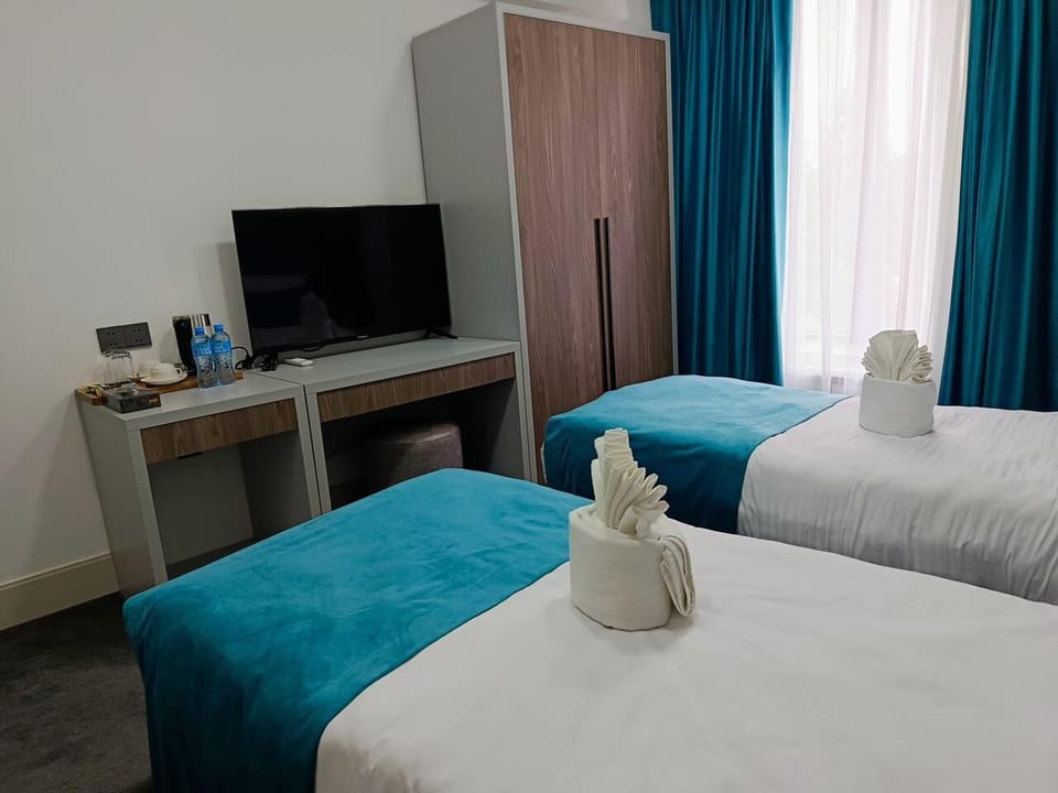 Comfort Twin Room, Non Smoking, Balcony | In-room safe, desk, laptop workspace, blackout drapes