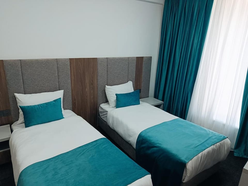 Comfort Twin Room, Non Smoking, Balcony | In-room safe, desk, laptop workspace, blackout drapes