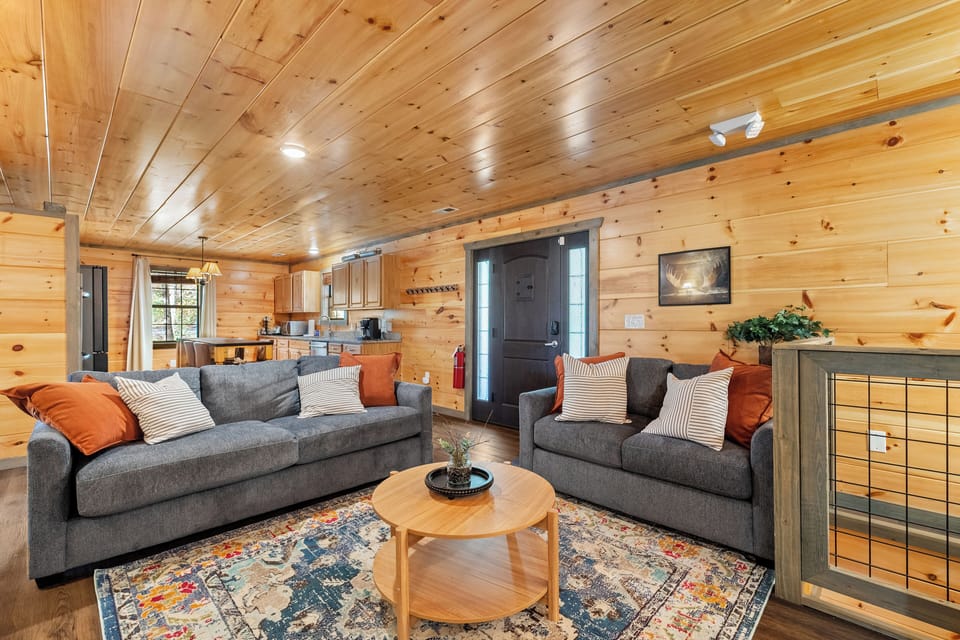 Bright, open-concept living room with plenty of space for everyone to enjoy.