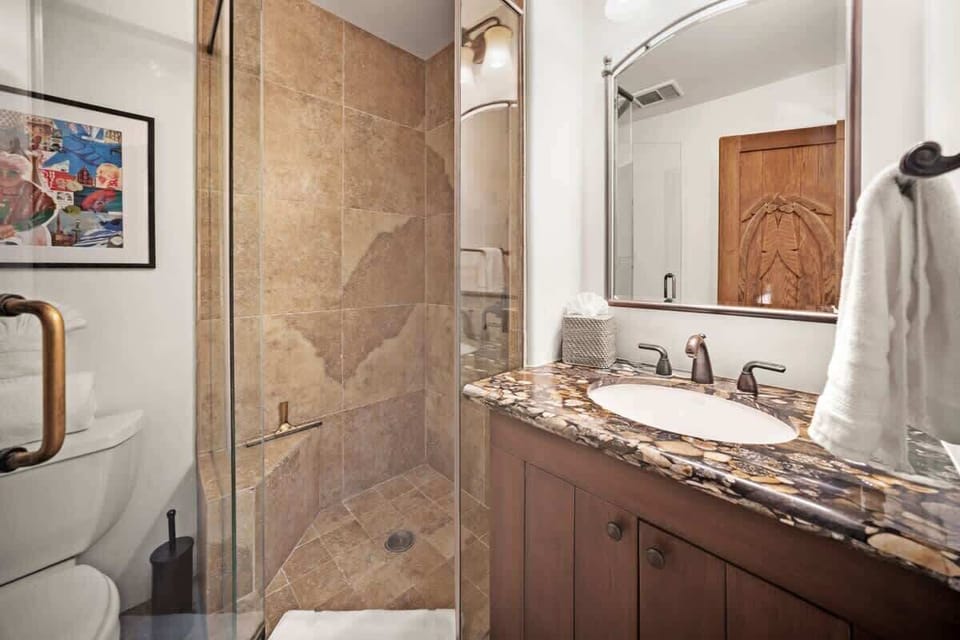 Shared full bath for both bedrooms in main house