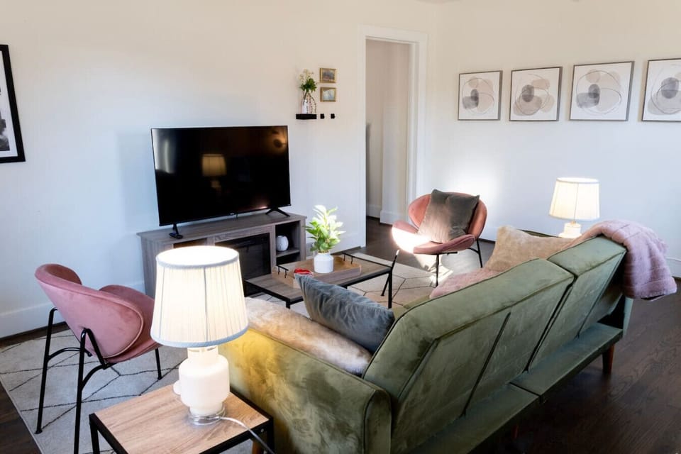 Ready for movie night? May I suggest `Gentlemen Prefer Blondes?` (It`s hard to see in this picture, but the TV stand doubles as a faux fire heater to max out the cozy ambiance).