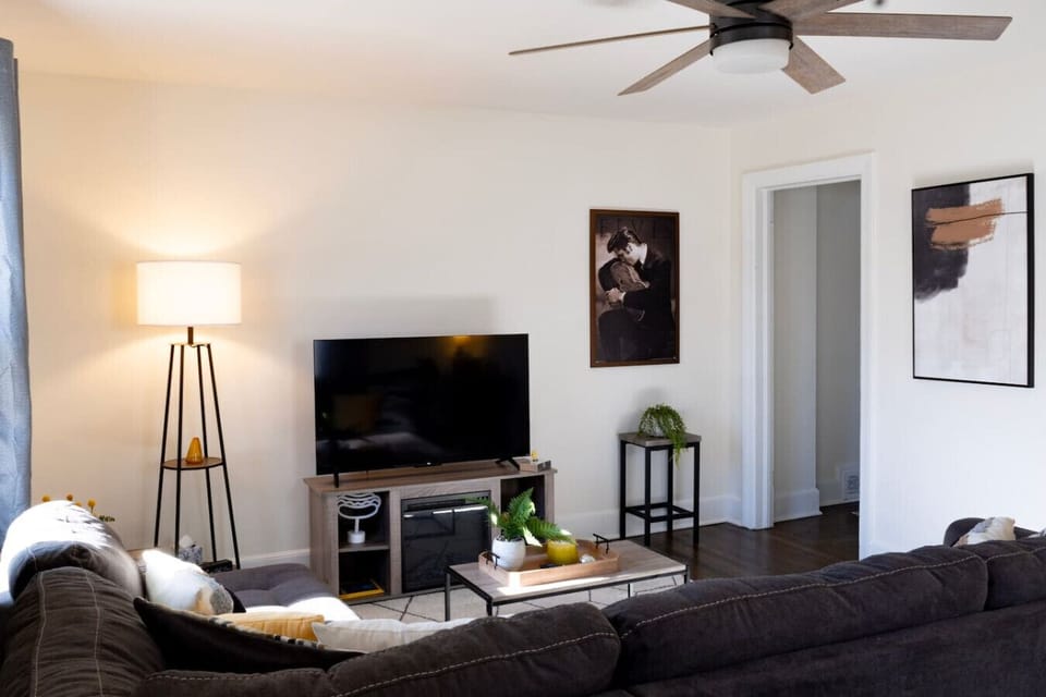 Our large TV sits atop a faux fire heater and delivers a great viewing experience in from the massive sectional.