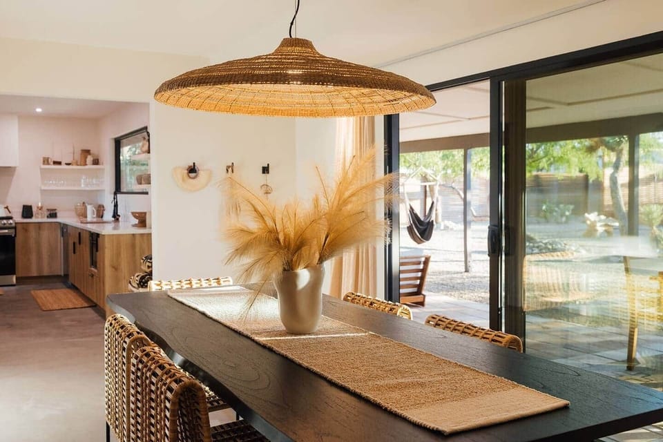 Dining room connects to kitchen and outdoor space making it perfect for a meal prepared in the kitchen or on the outdoor BBQ.