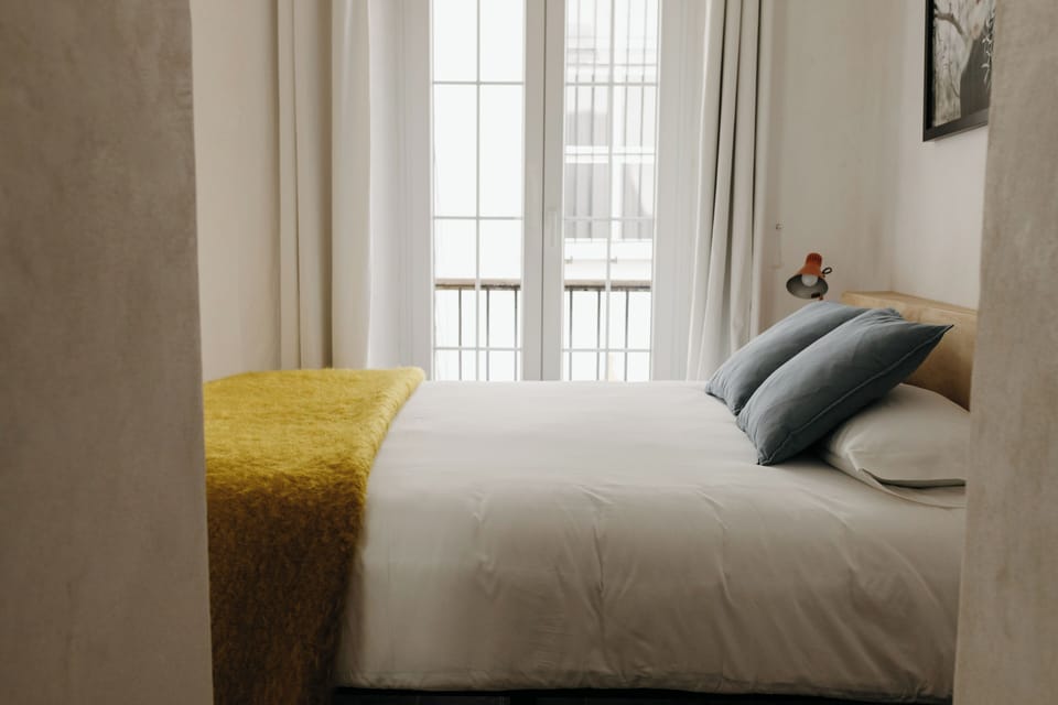 Double Room, Balcony, City View | In-room safe, blackout drapes, iron/ironing board, free WiFi