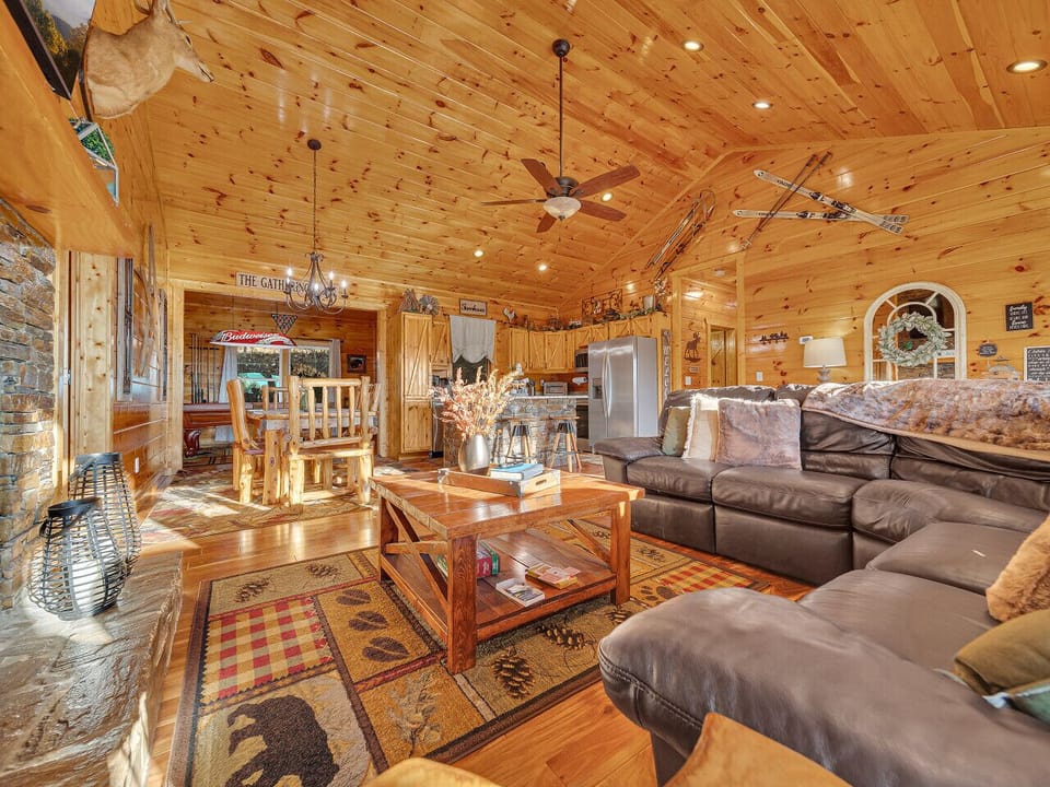 Cozy Living Room | Stone Fireplace | Leather Seating | Mountain Views