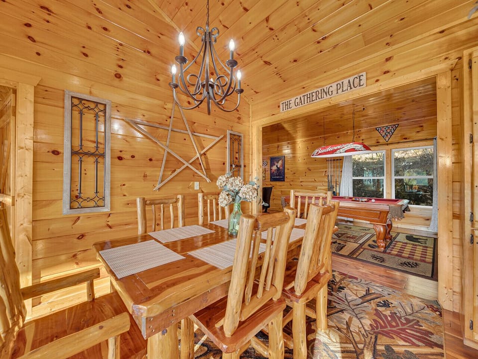 Dining Area | Rustic Wood Table | Chandelier Lighting | Scenic Views