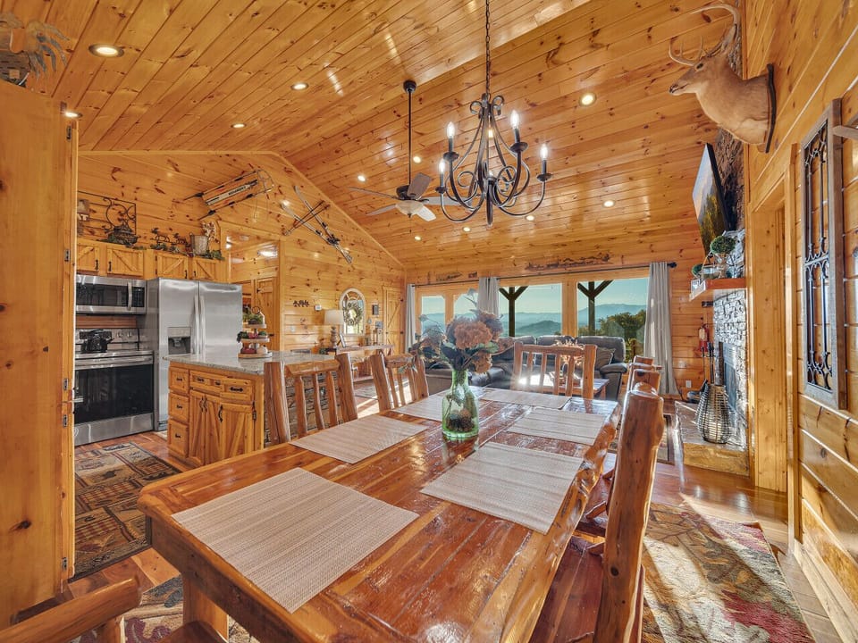 Dining Area | Rustic Wood Table | Chandelier Lighting | Scenic Views