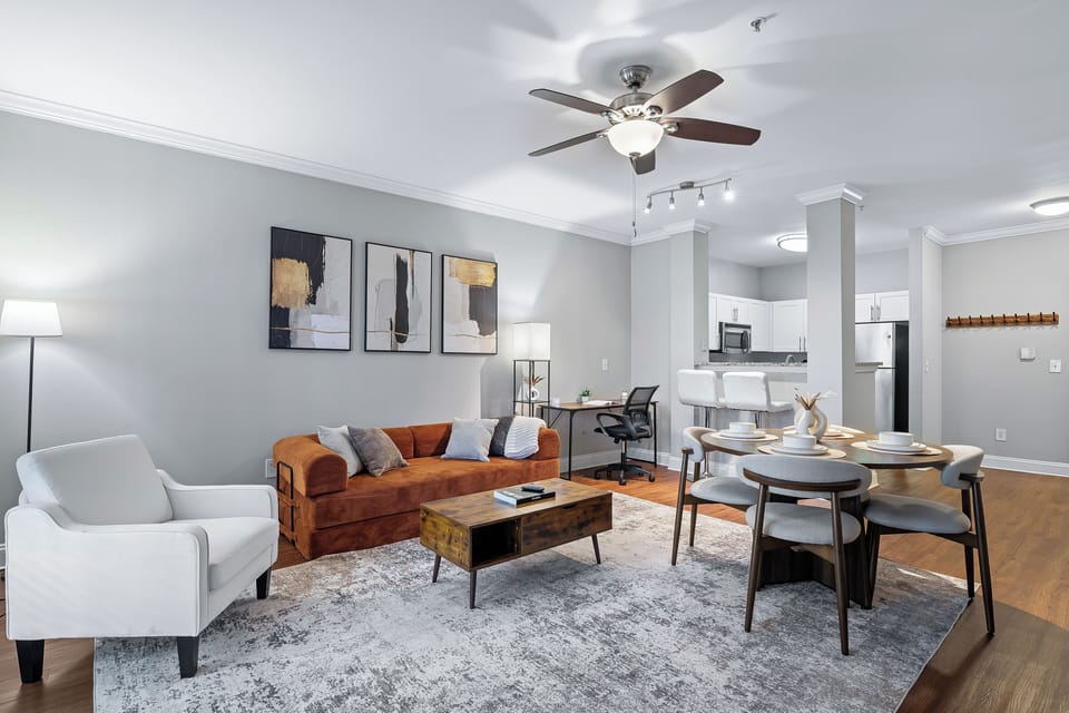 Everything you need in one space — sofa bed, dining, workspace & full kitchen