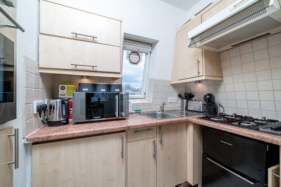 Stylish, contemporary kitchen featuring everything you need for effortless meal prep.
