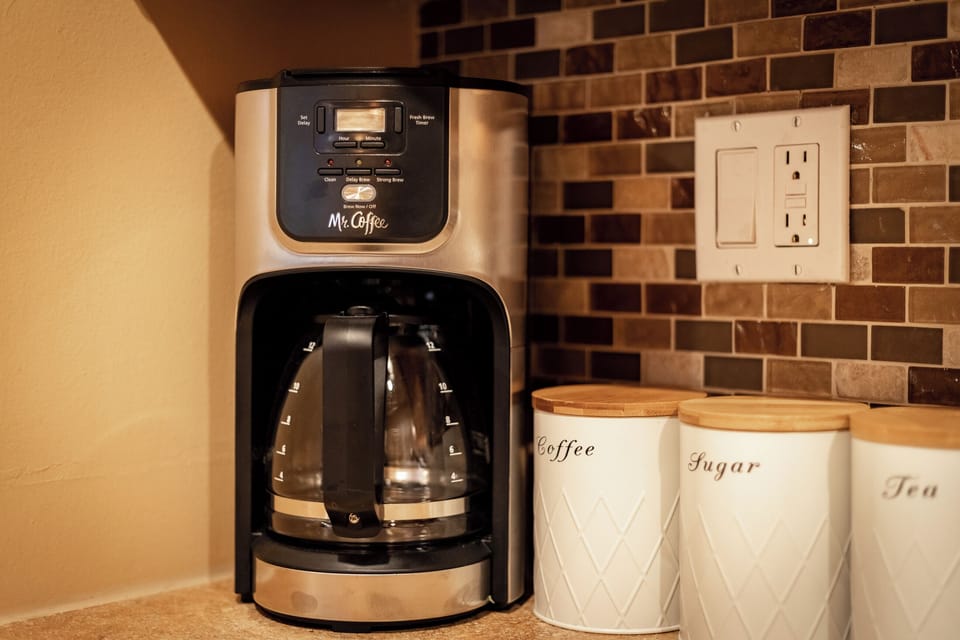 Your morning ritual starts here—fresh coffee, quiet light, and Tahoe just beyond the window.
