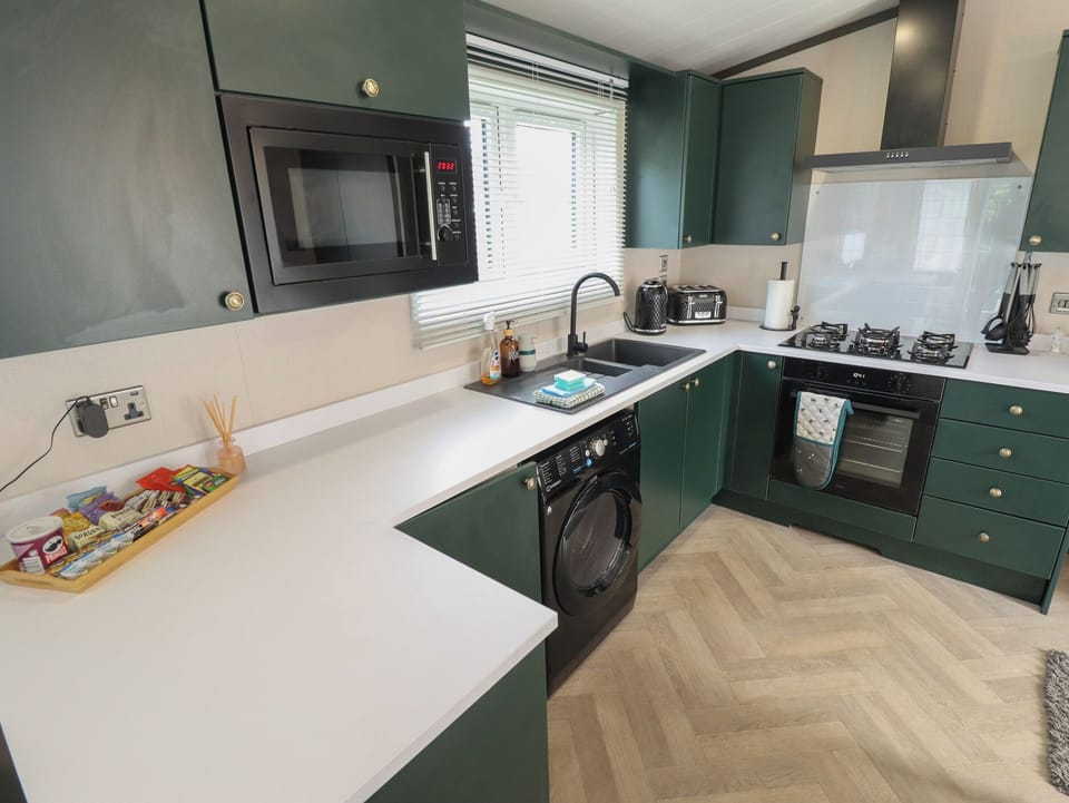 Fridge, microwave, cookware/dishes/utensils
