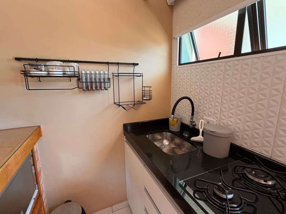 Apartment | Private kitchen | Fridge, microwave, stovetop, cookware/dishes/utensils