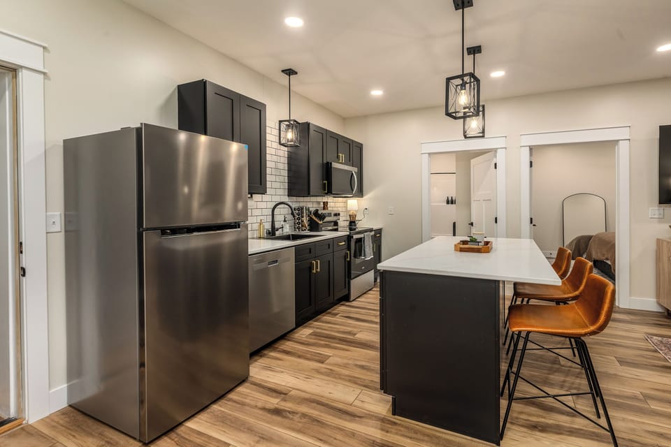 Dishwasher, full size stove and refridgerator in the suite