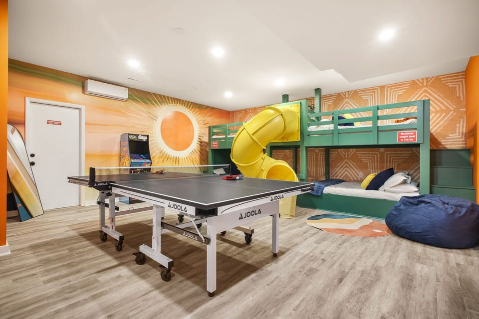 Bedroom 5 / Games Room: Ping pong, board games, three comfy bean bags, and endless entertainment for families & groups.
