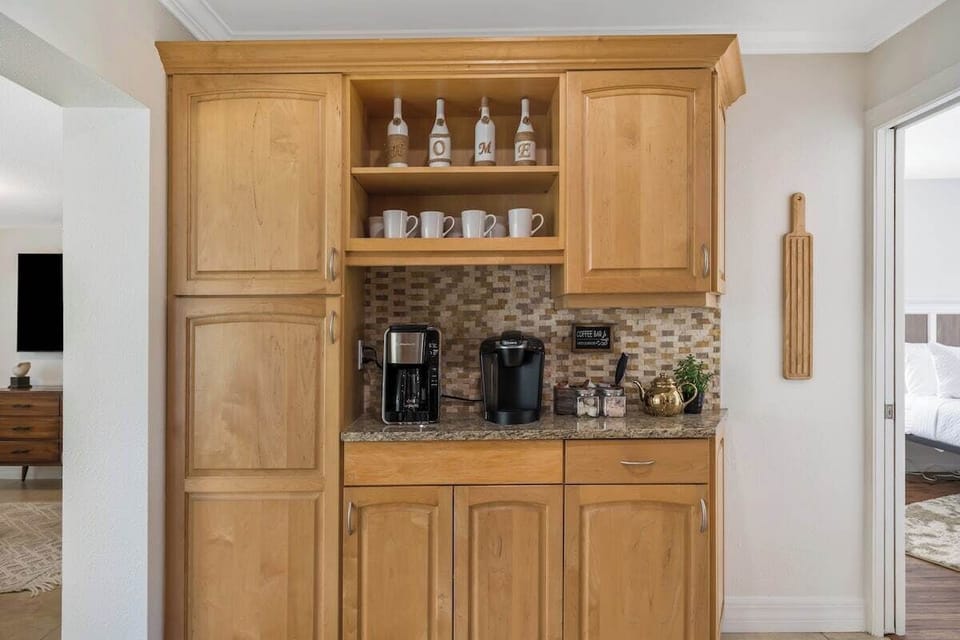 Enjoy your mornings with a fresh cup of coffee from the coffee bar equipped with a Keurig machine & a standard coffee maker!